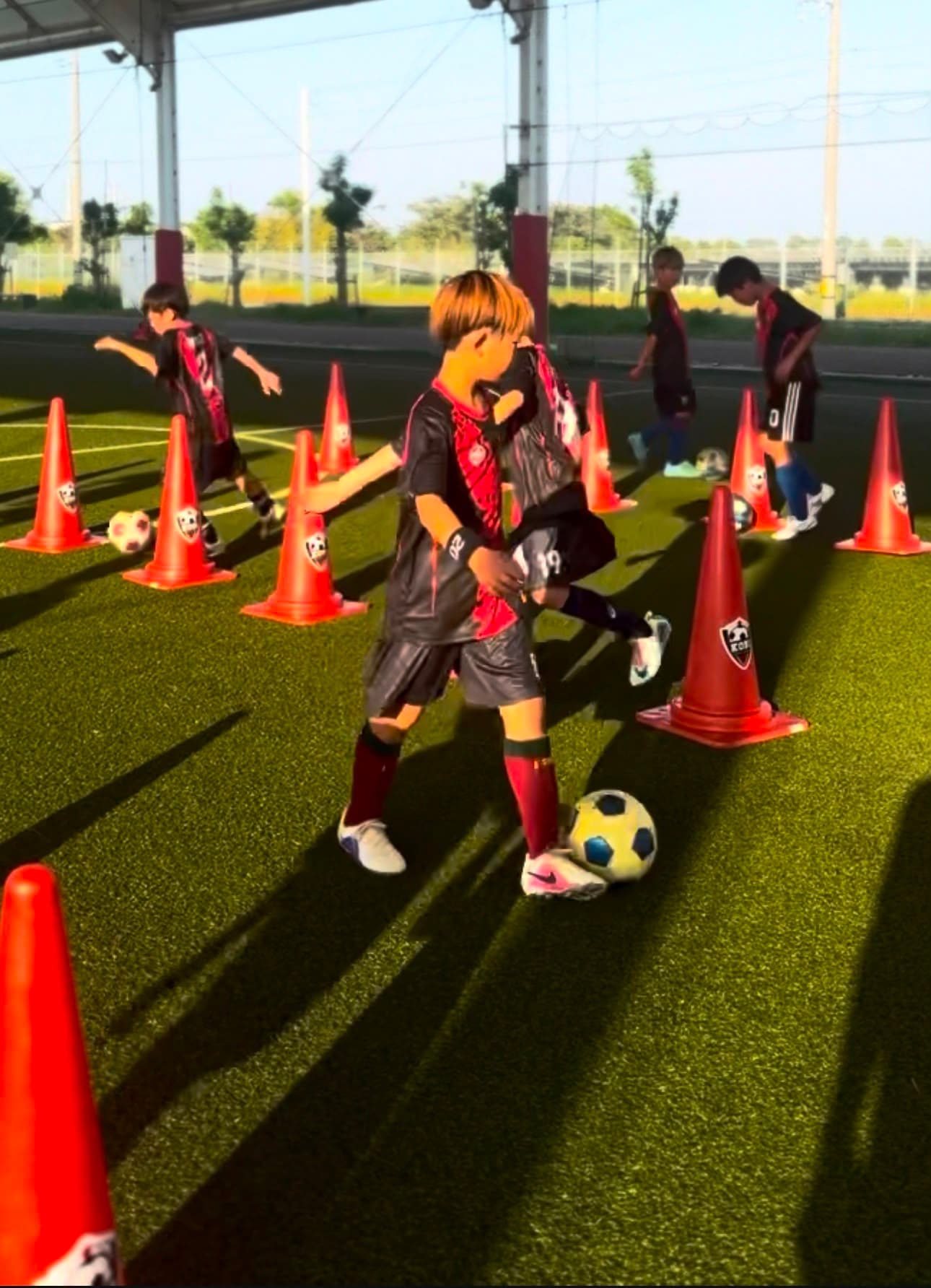 コーンを使ったドリブル練習